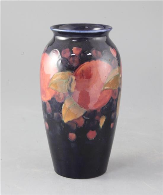 A Moorcroft pomegranate pattern baluster vase, height 18.5cm
